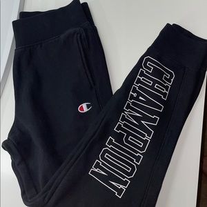 Black champion sweatpants with logo on legs
